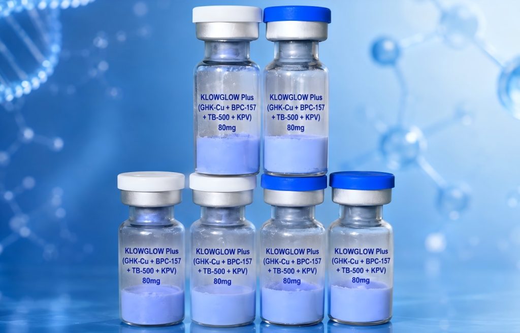 Multiple glass vials of KLOWGLOW Plus 80mg peptide blend on a blue laboratory background.